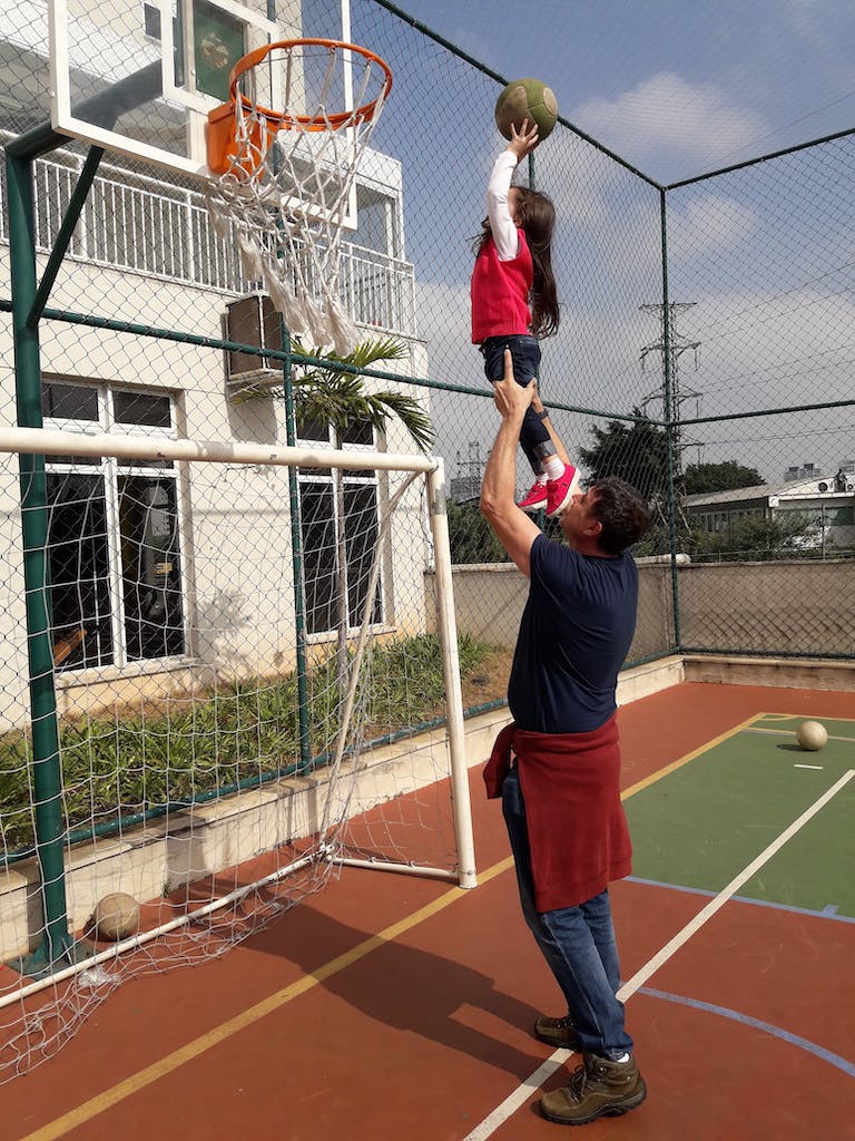 father and daughter participating in fun physical activities for families 